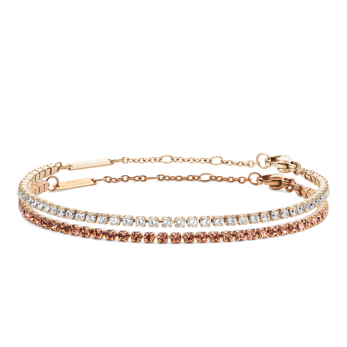 Two rose gold tennis bracelets, one set with apricot-toned crystals and the other with clear stones, displayed side by side to showcase their delicate chains and refined, sparkling design.