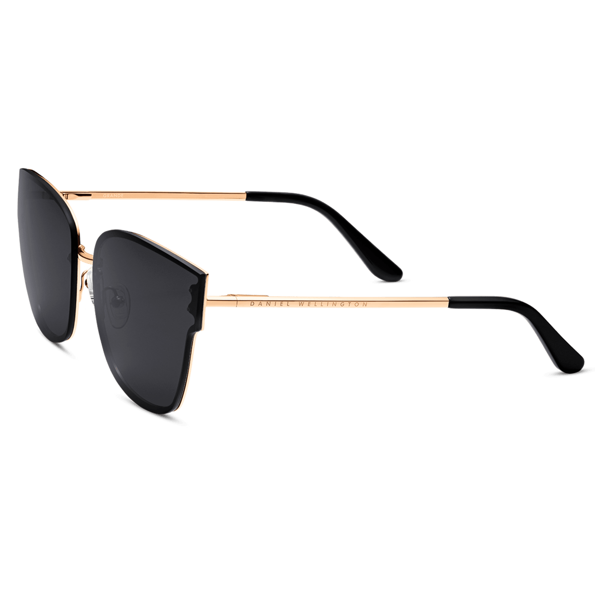 Steel Grande Rose Gold sunglasses featuring an oversized rose gold plated stainless steel frame, bold black lenses, and black acetate temple tips, shown from a side angle.