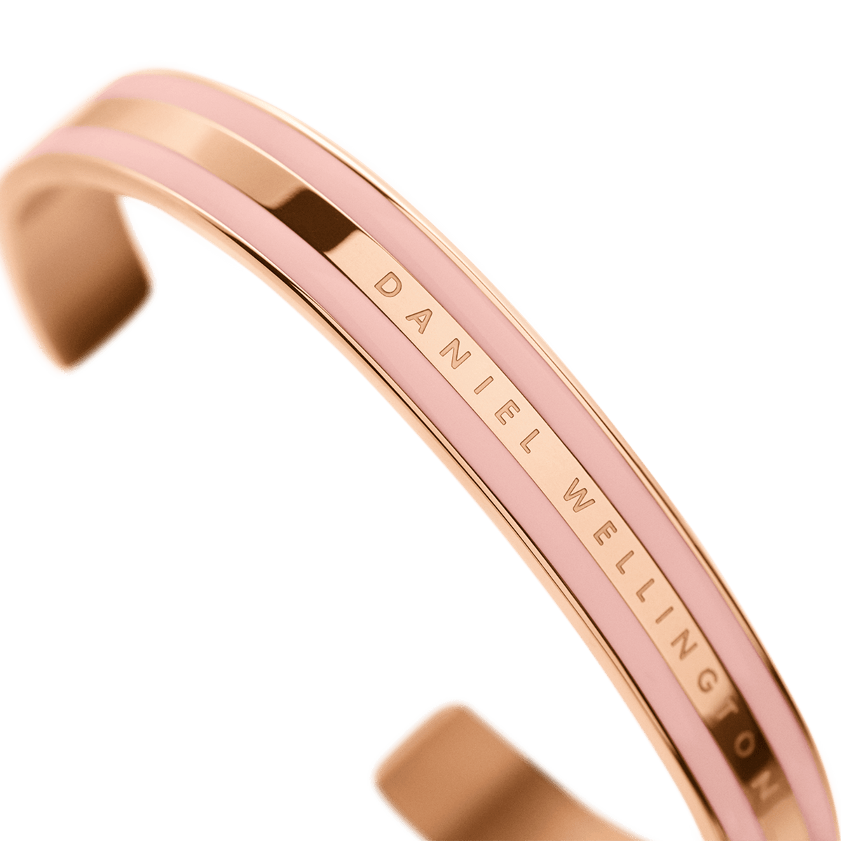 Close-up of the Daniel Wellington Emalie Bracelet in dusty rose and rose gold, highlighting the polished enamel inlay and engraved logo detail.