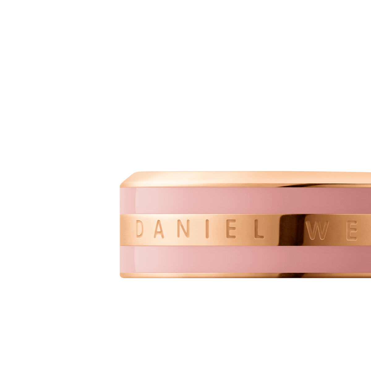 Close-up of the Emalie Ring in rose gold with a dusty rose enamel band and Daniel Wellington engraved detailing.