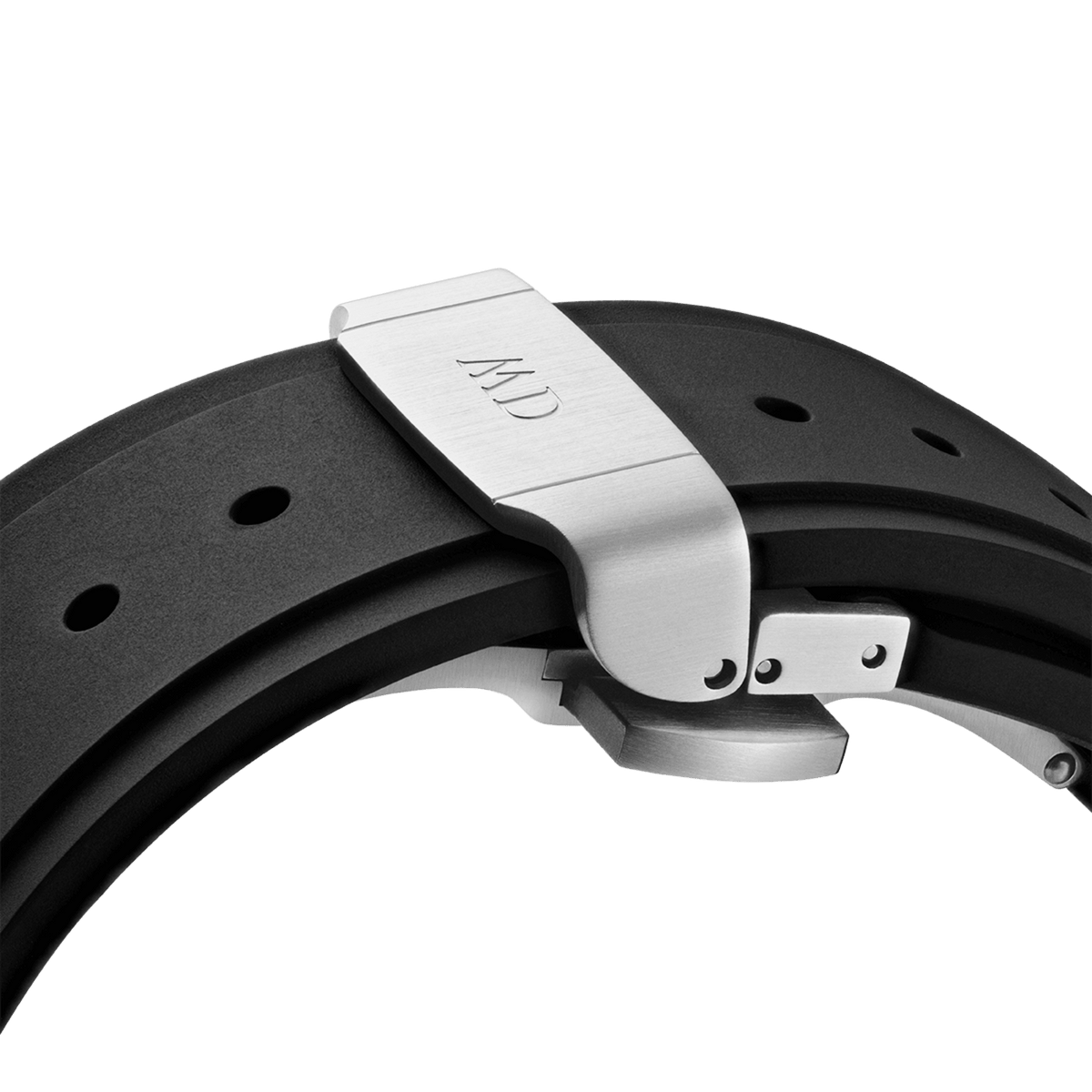Close-up of the Daniel Wellington Switch Silver Apple Watch case’s black rubber strap with a brushed stainless steel deployment clasp engraved with the DW logo.