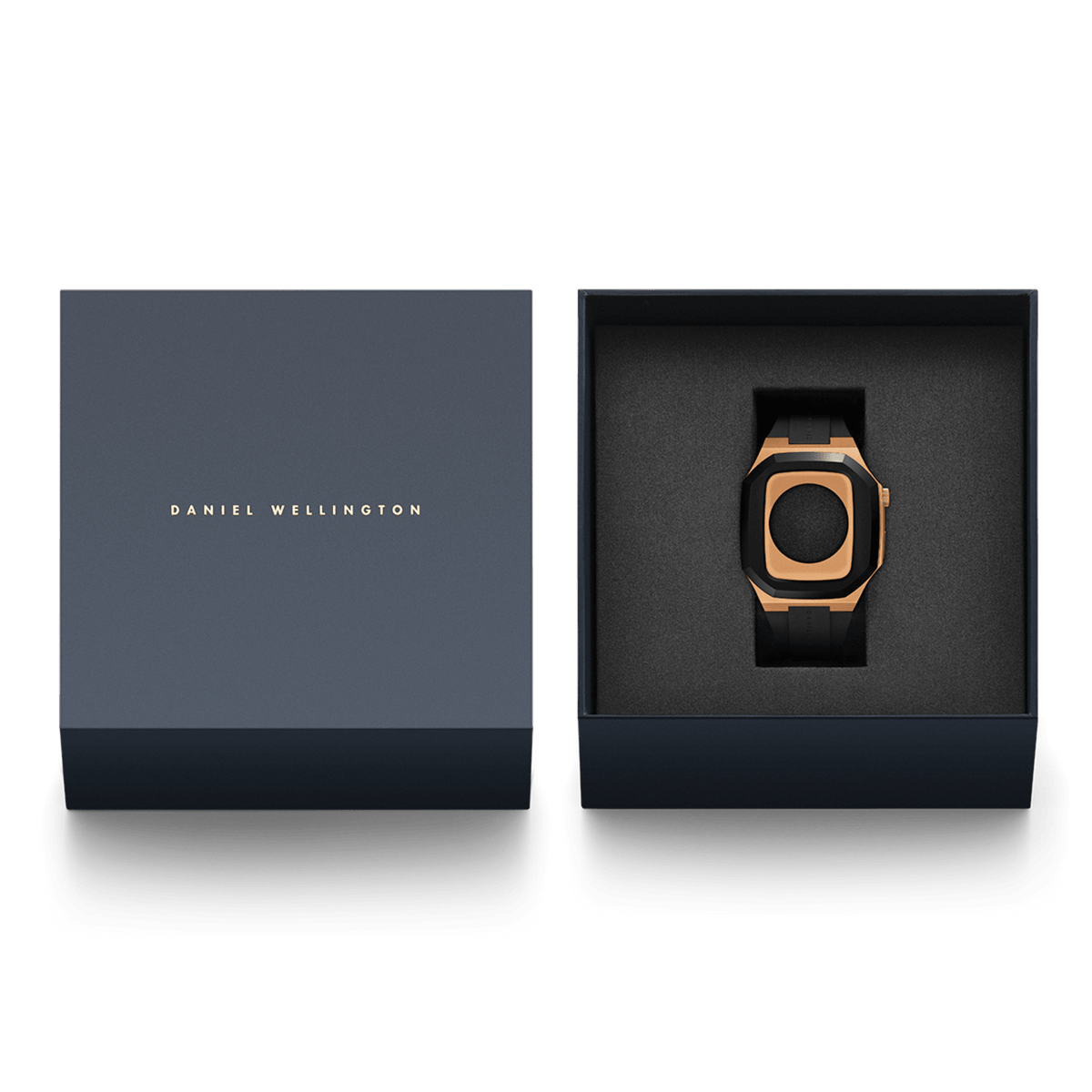 Switch Rose Gold Apple Watch case with black strap presented in an elegant navy Daniel Wellington gift box.