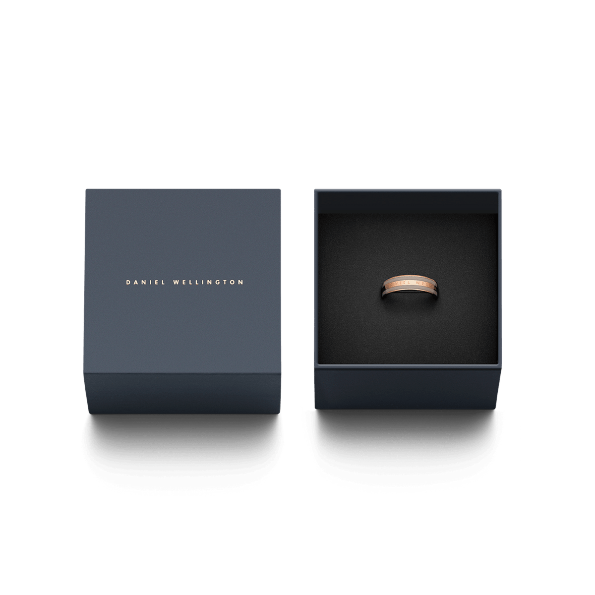 Emalie Ring Desert Sand Rose Gold presented in an elegant Daniel Wellington gift box, highlighting its polished rose gold band and subtle enamel inlay.