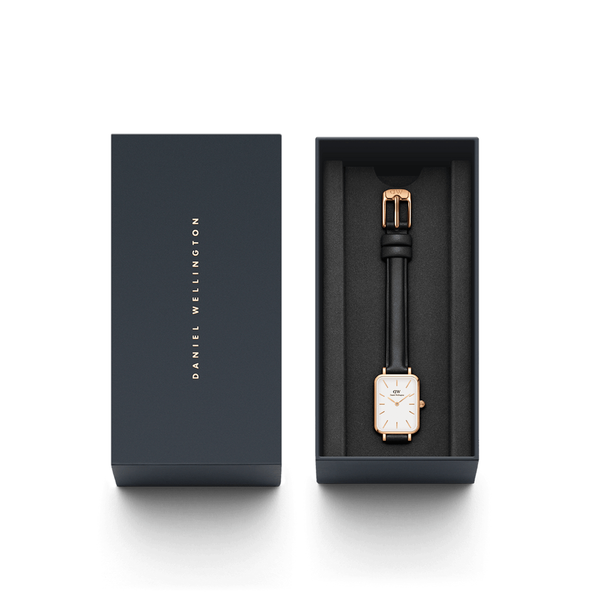 Daniel Wellington Quadro Pressed Sheffield watch with a rectangular eggshell white dial, rose gold case, and black leather strap, elegantly presented in a branded gift box.