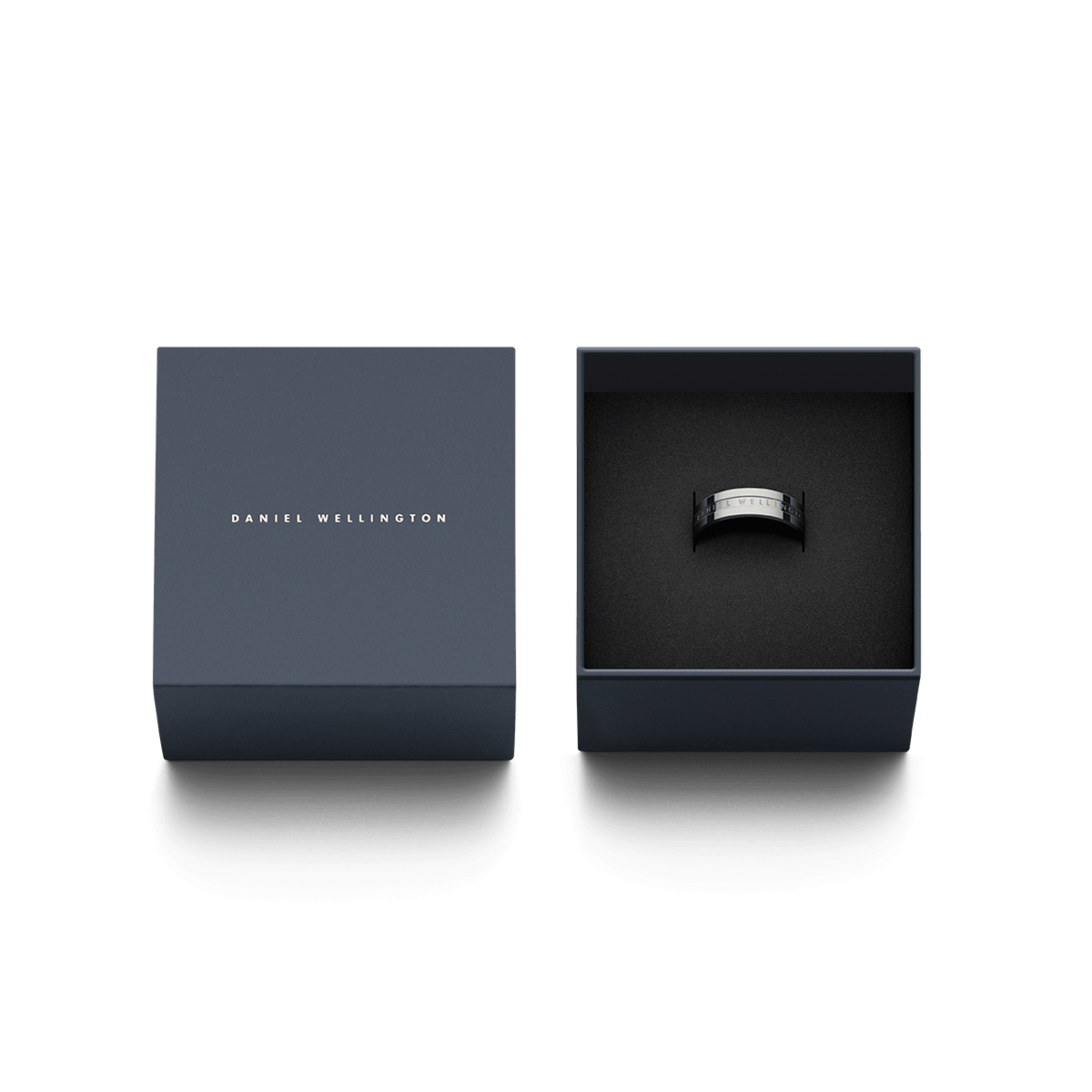 Elan Ring Silver presented in an elegant dark blue Daniel Wellington gift box with the lid beside it.