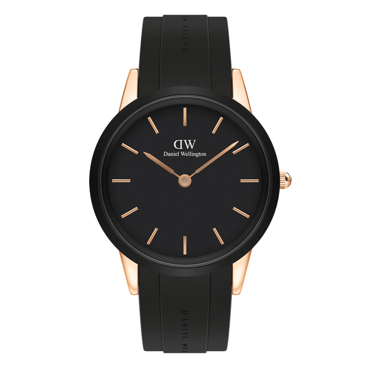 Rose gold women’s sport watch with black dial, minimalist markers, and black rubber strap by Daniel Wellington.