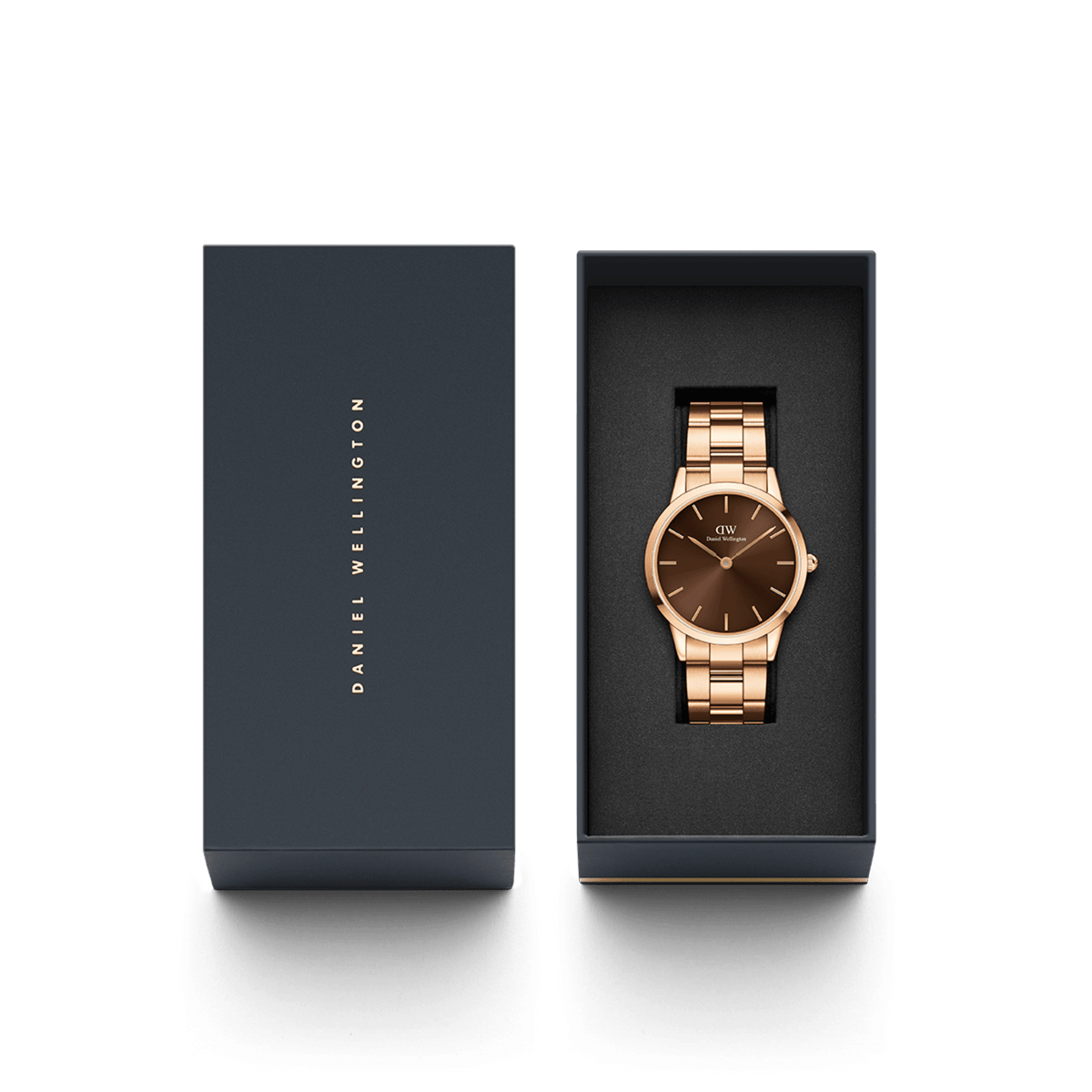Daniel Wellington Iconic Link Amber watch with a rose gold bracelet and brown sunray dial, presented in an elegant branded gift box.