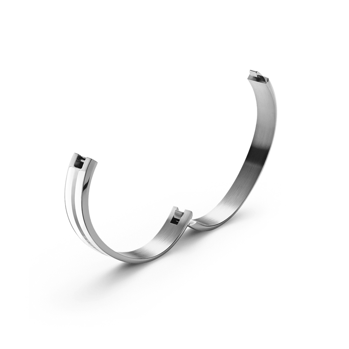 Open Emalie Infinite Silver Satin White bangle showing the integrated closing system and brushed stainless steel interior.