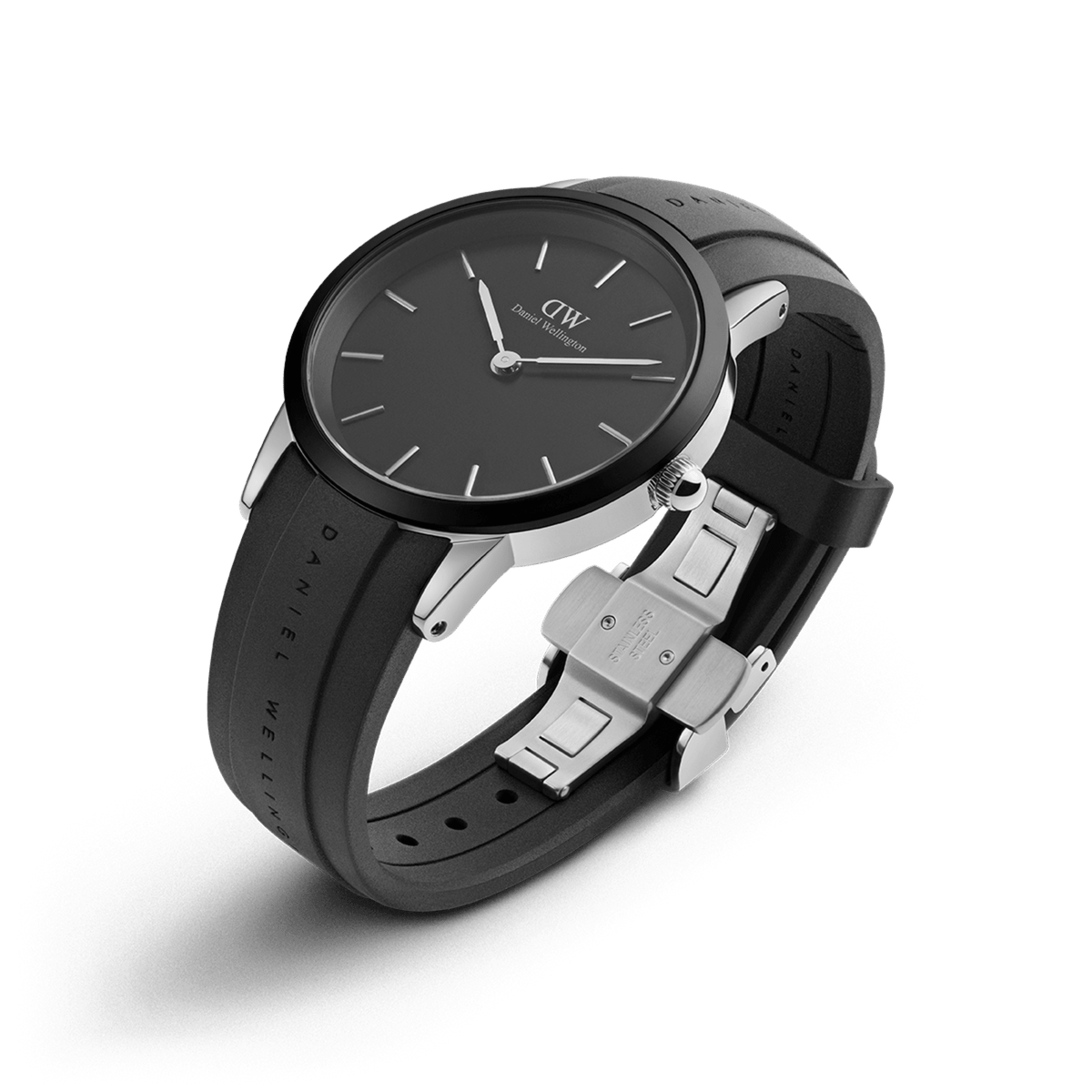Daniel Wellington Iconic Motion watch with a black dial, minimalist silver markers, and a black FKM rubber strap featuring an engraved logo and stainless steel deployment clasp.