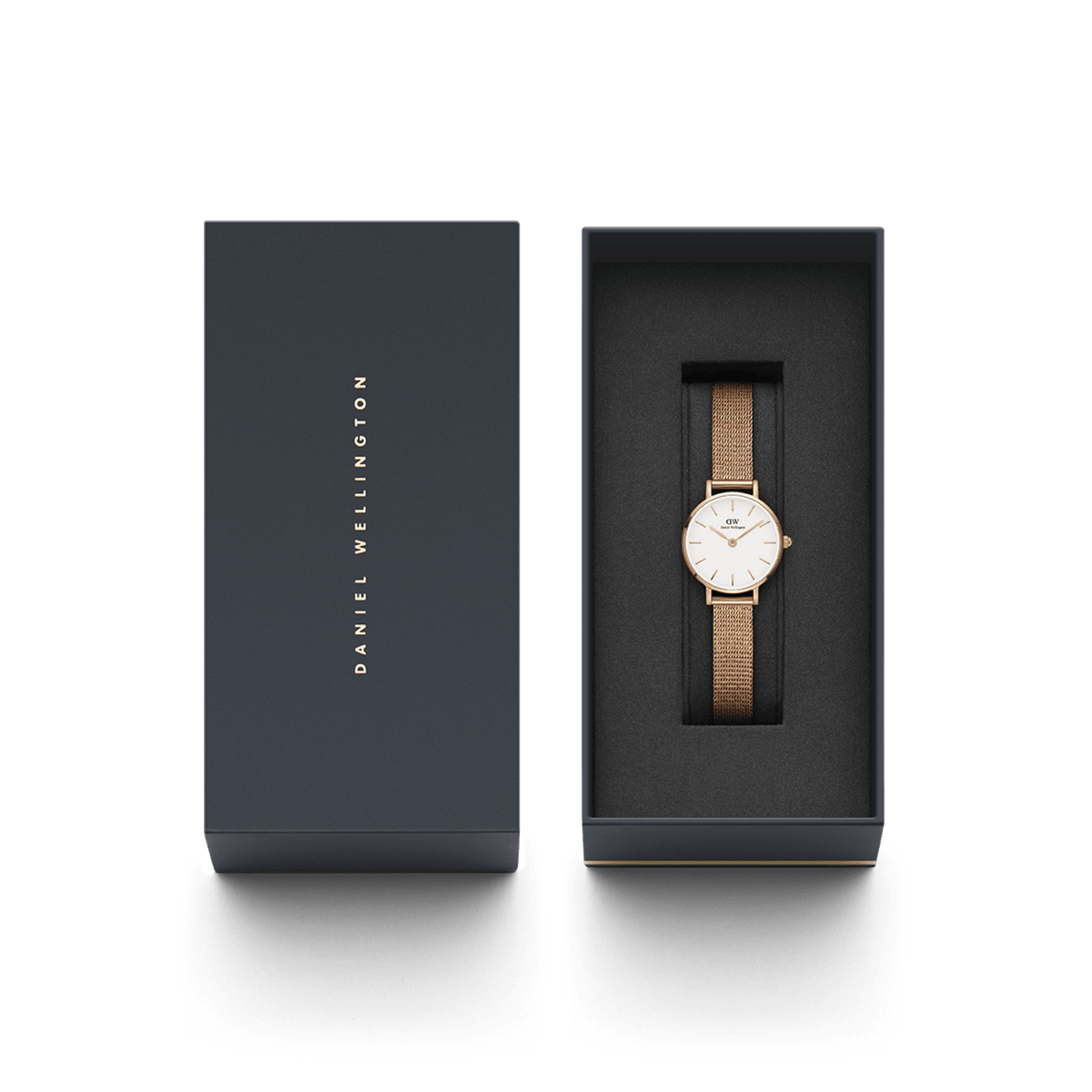 Petite Pressed Melrose rose gold mesh strap watch with white dial, elegantly presented in a Daniel Wellington gift box.