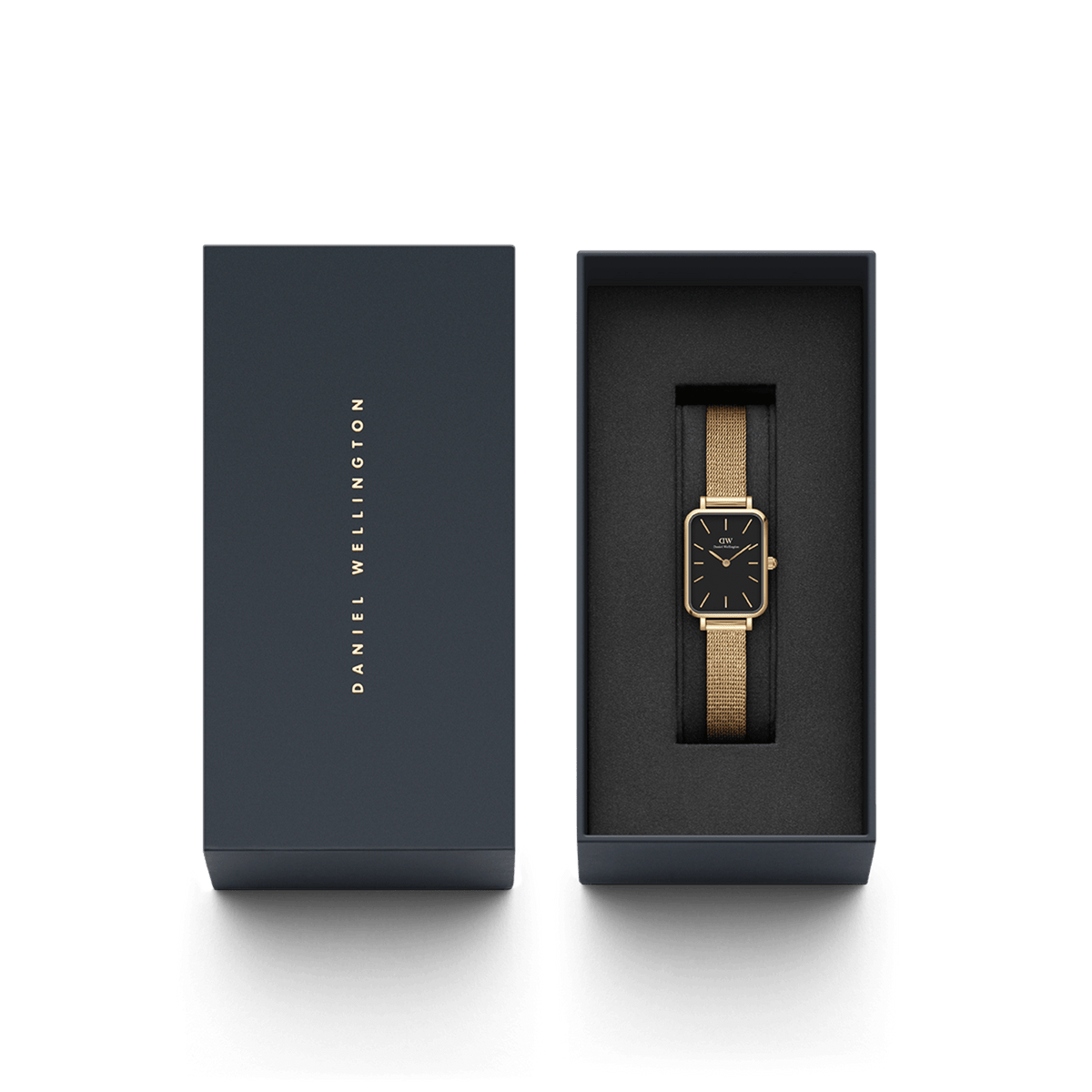 Quadro Pressed Evergold Black Gold watch with a gold mesh strap and black dial, elegantly presented in a dark Daniel Wellington gift box.