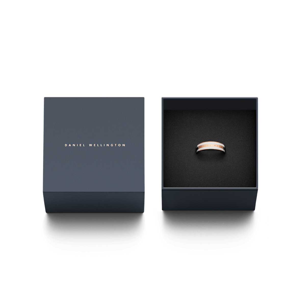 Emalie Ring Satin White Rose Gold presented in an elegant Daniel Wellington gift box, highlighting its rose gold and white enamel band.