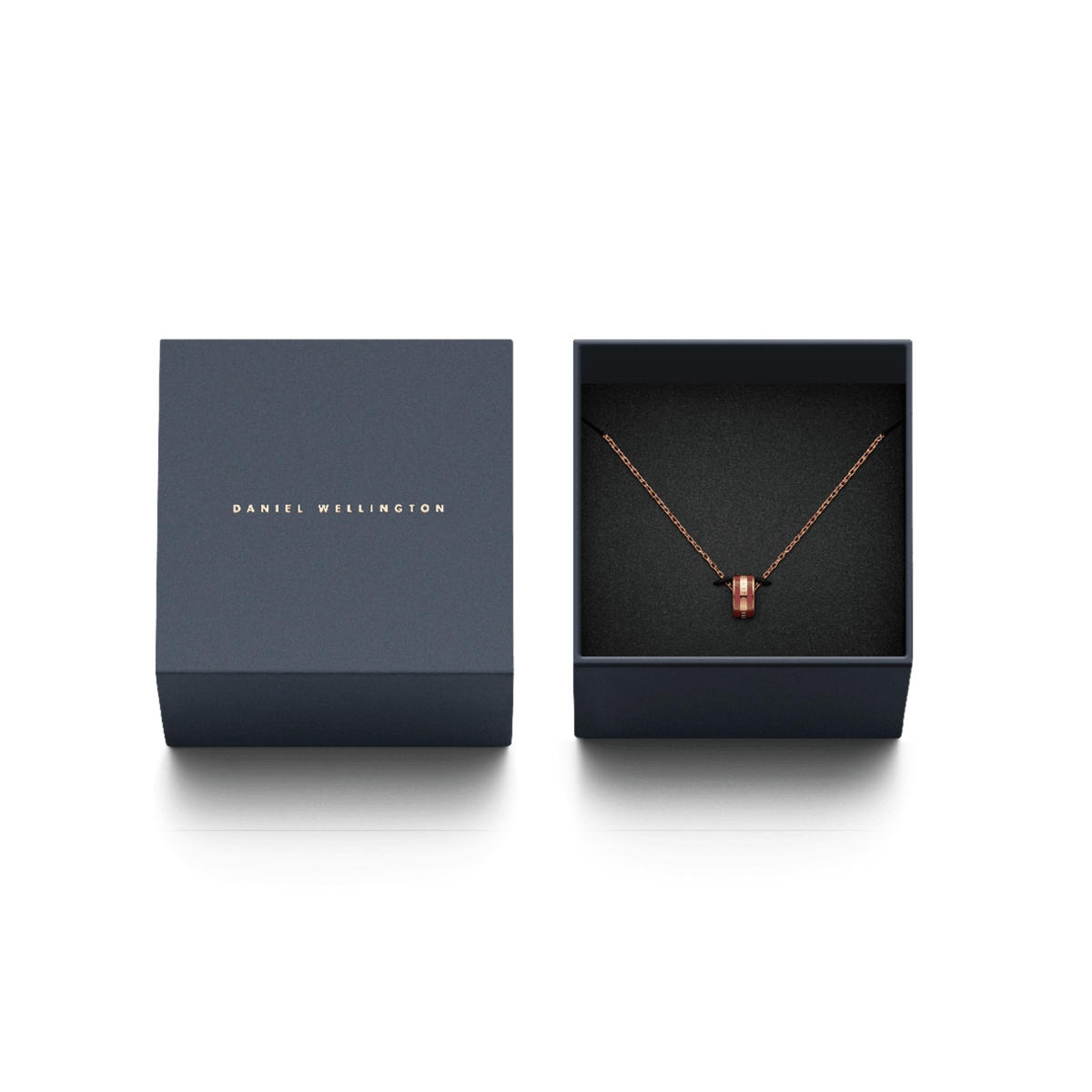 Emalie Necklace Cherry Blush Rose Gold displayed in an elegant navy gift box, featuring a rose gold chain and cherry blush enamel barrel pendant.