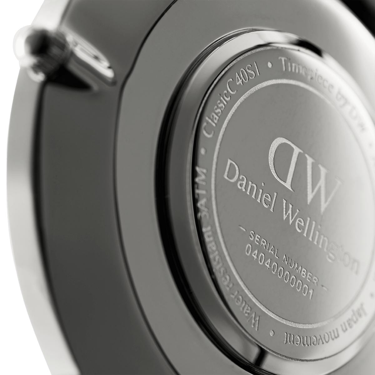 Back of Classic Sheffield Silver watch showing engraved Daniel Wellington logo, water resistance and Japanese movement details.