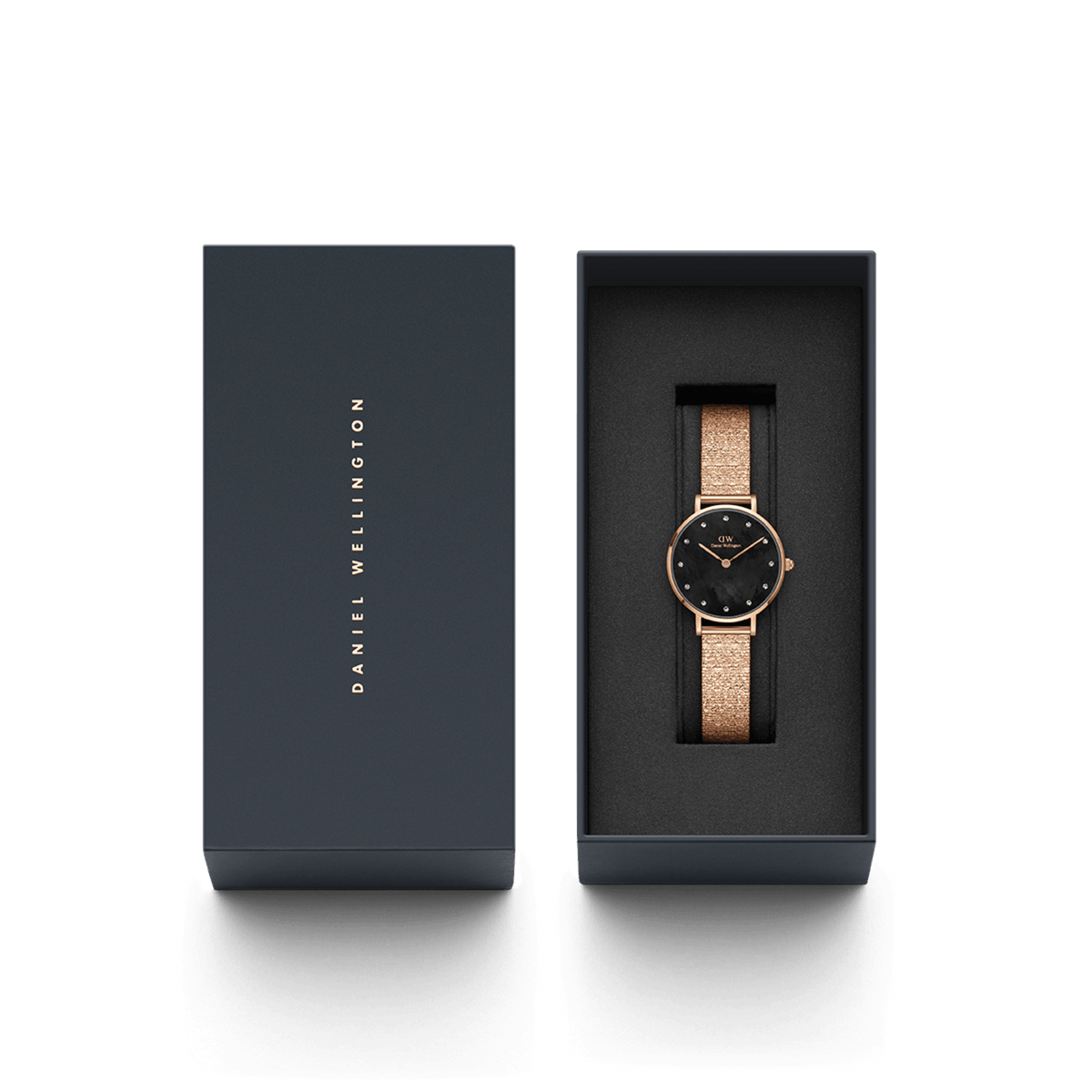 Petite Lumine Pressed Piano Black MoP Rose Gold watch with a black mother-of-pearl dial and rose gold mesh strap, elegantly presented in a Daniel Wellington gift box.