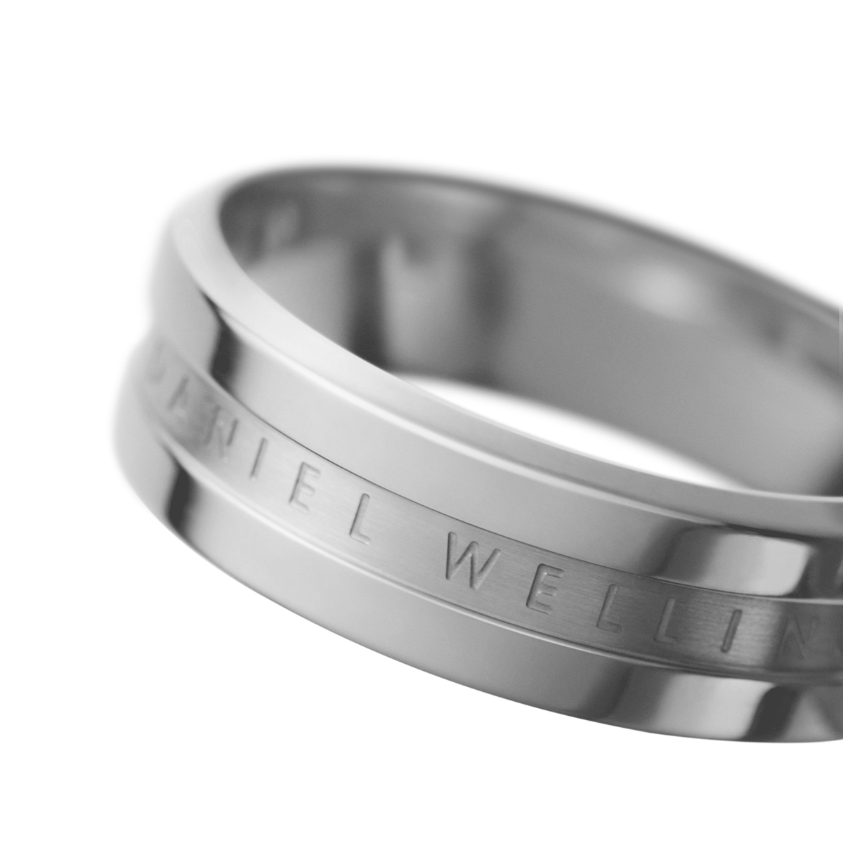 Close-up of the Elan Ring Silver showing its polished stainless steel band and engraved Daniel Wellington signature detail.