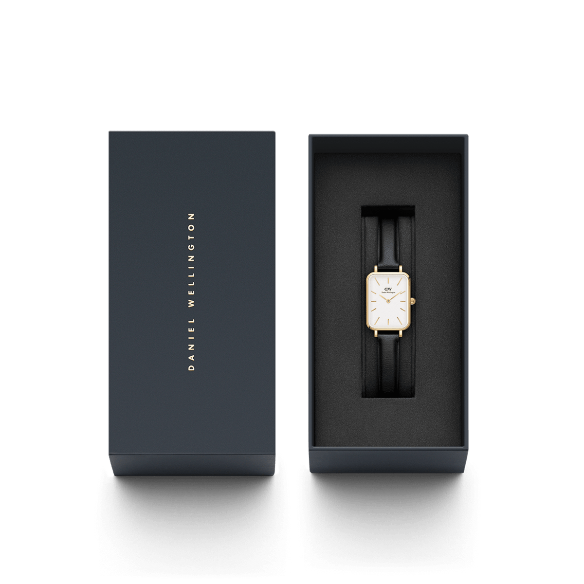 Quadro Pressed Sheffield Gold women’s watch with black leather strap in a navy Daniel Wellington gift box.