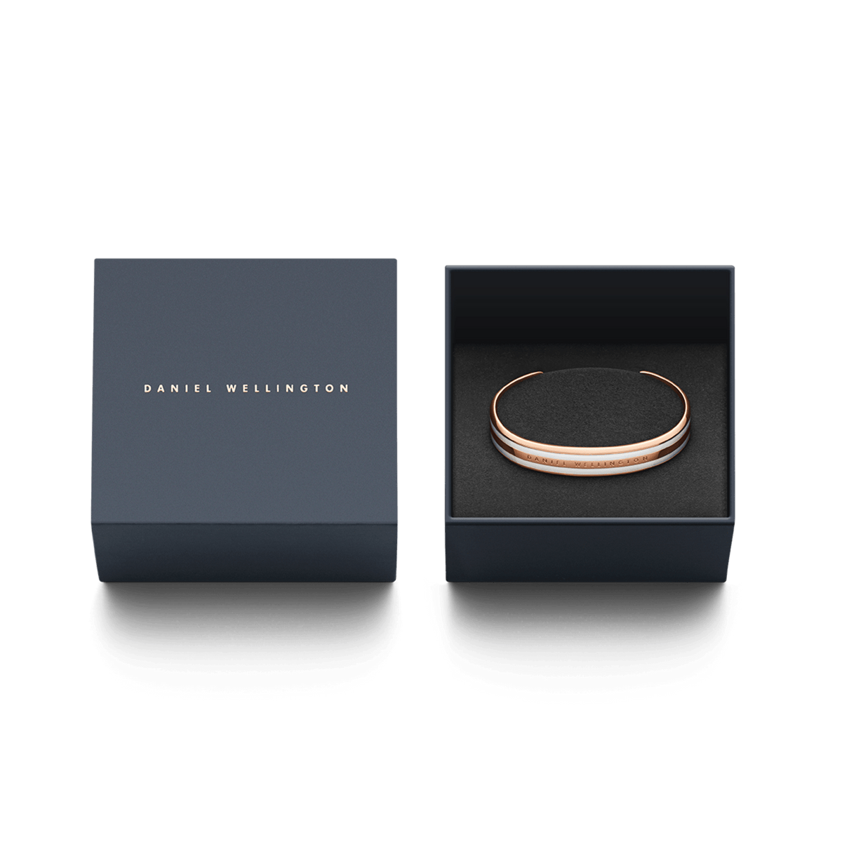 Emalie Bracelet Satin White Rose Gold presented in an elegant black Daniel Wellington gift box, highlighting its refined rose gold and white enamel design.
