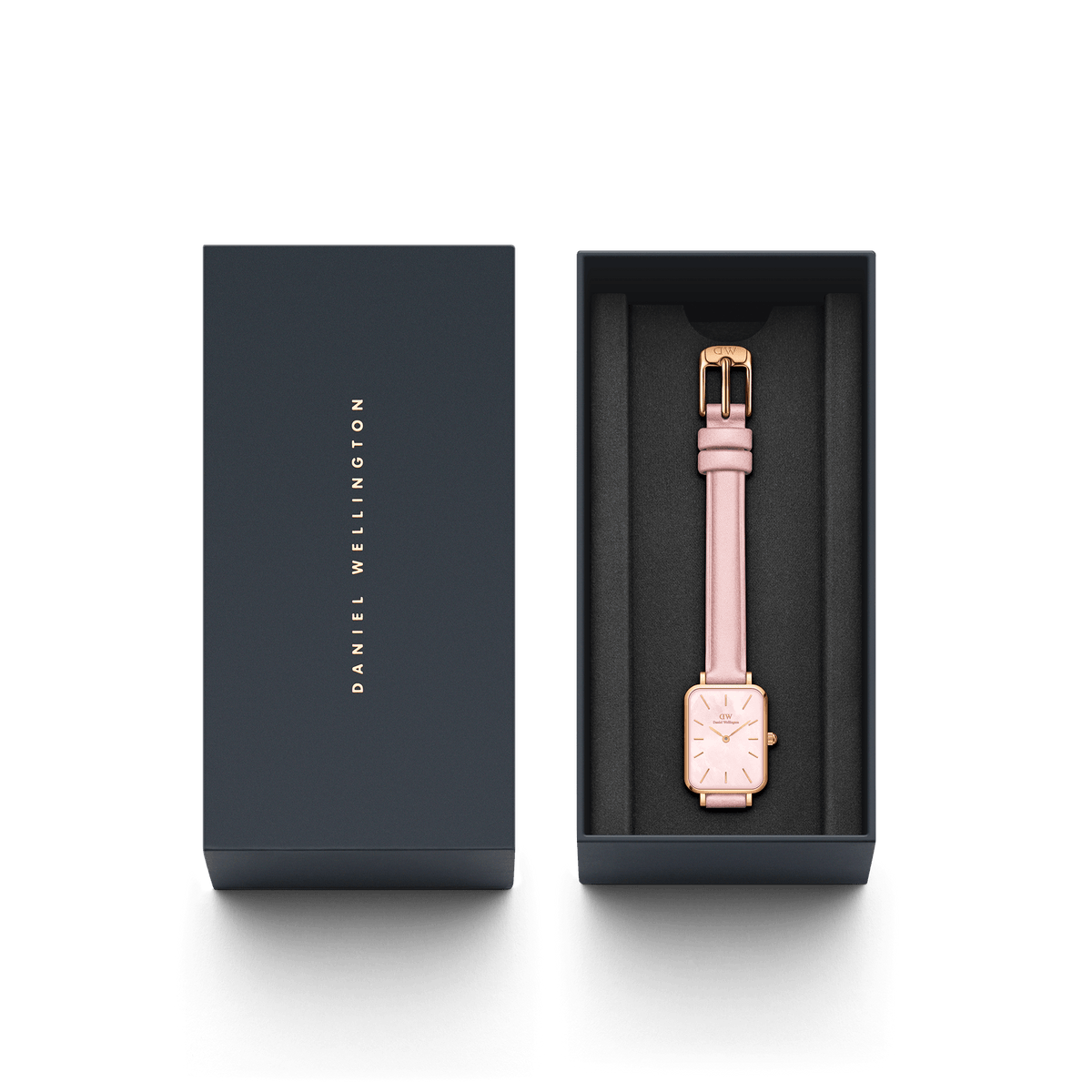 Daniel Wellington Quadro Cherry Blossom watch with a pink leather strap and rose gold case, elegantly presented in a branded gift box.