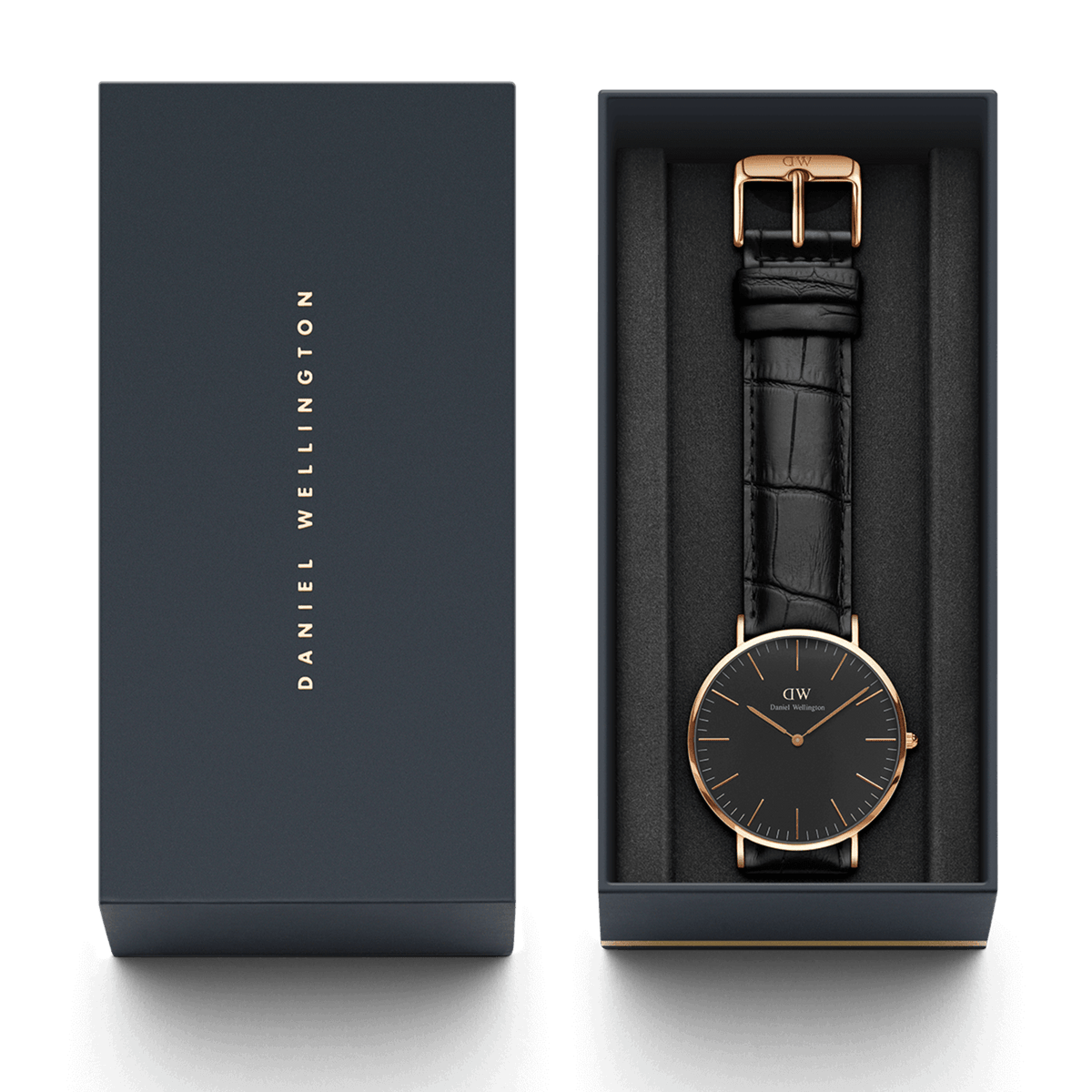 Classic Reading Black Rose Gold watch with a black croc-embossed leather strap presented in a signature Daniel Wellington gift box.