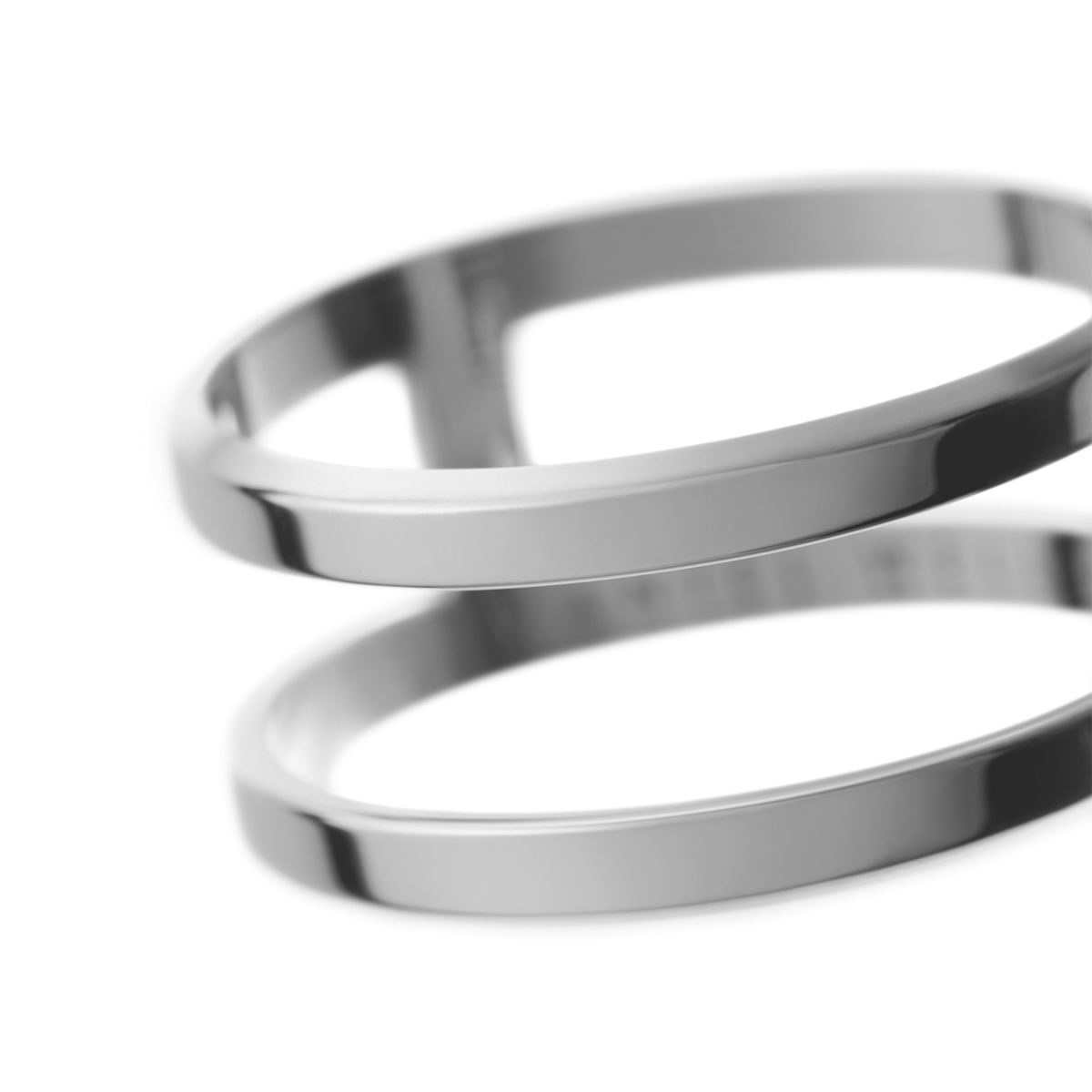 Close-up of the Elan Dual Ring Silver, highlighting its polished dual band design and smooth, minimalist finish.