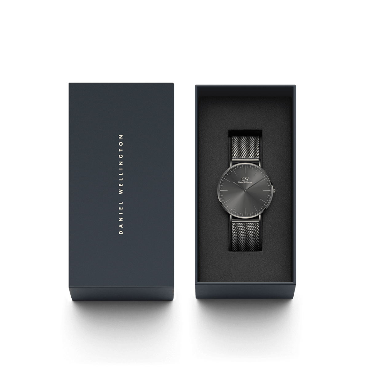 Classic Mesh Graphite watch with a graphite sunray dial and mesh strap, elegantly presented in Daniel Wellington’s signature gift box.