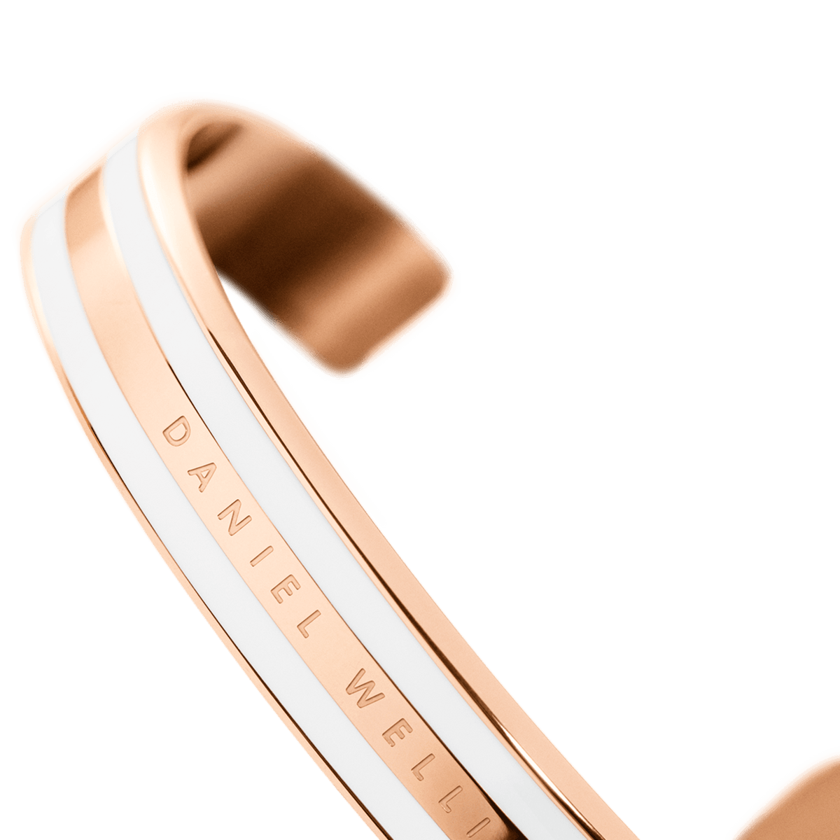 Angled close-up of the Emalie Bracelet Satin White Rose Gold, showcasing its satin white enamel detailing and engraved Daniel Wellington logo on the rose gold cuff.