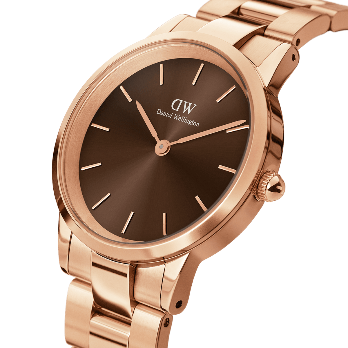 Close-up of the Daniel Wellington Iconic Link Amber watch showing its polished rose gold stainless steel bracelet and minimalist amber brown sunray dial.