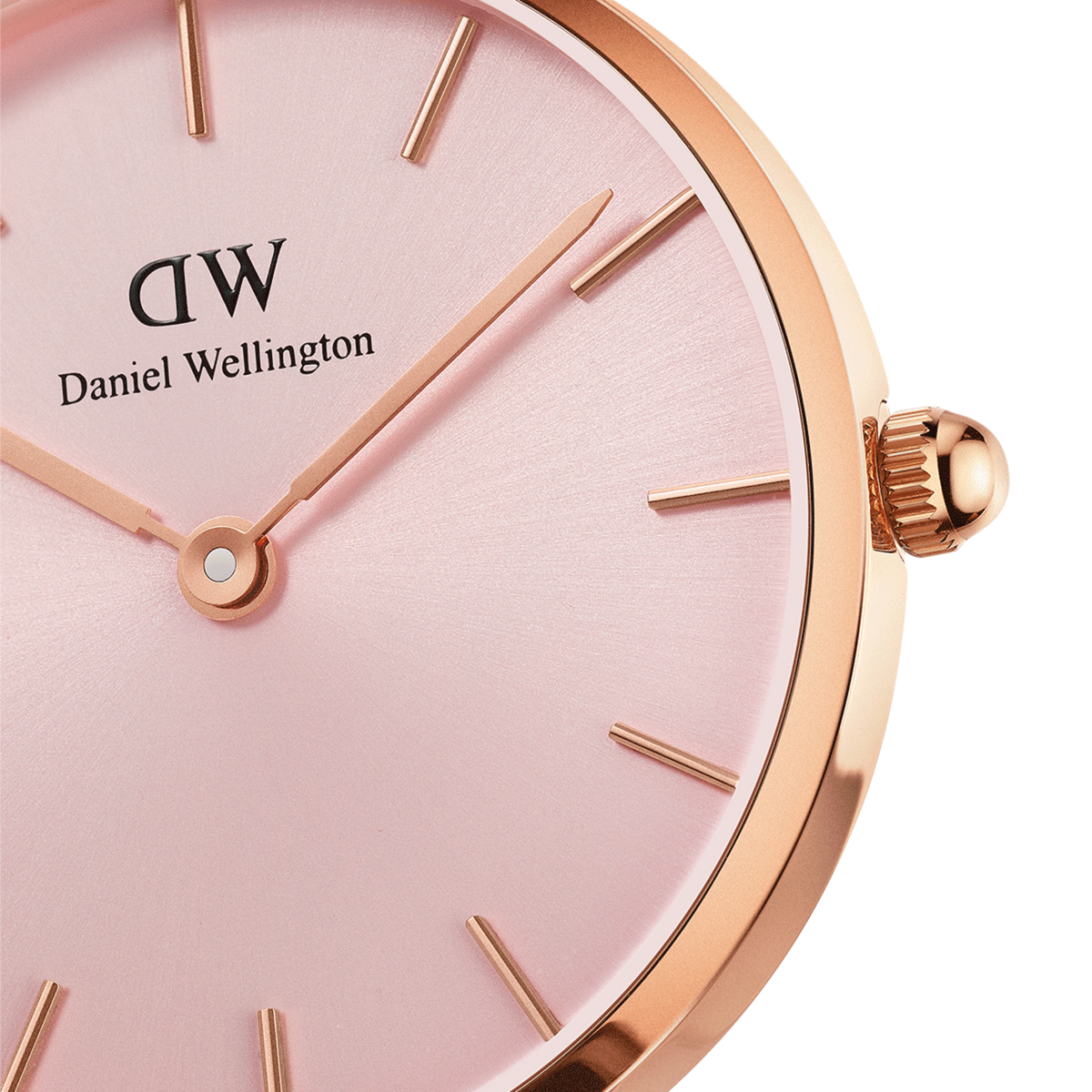 Close-up of the Petite Melrose Light Pink watch showing its soft pink dial, minimalist gold hour markers, and rose gold case detailing.