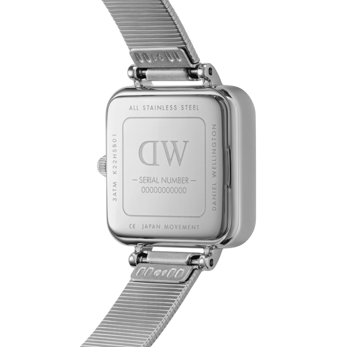 Back view of Quadro Studio Silver watch showing stainless steel case, engraved branding, and piano link strap.