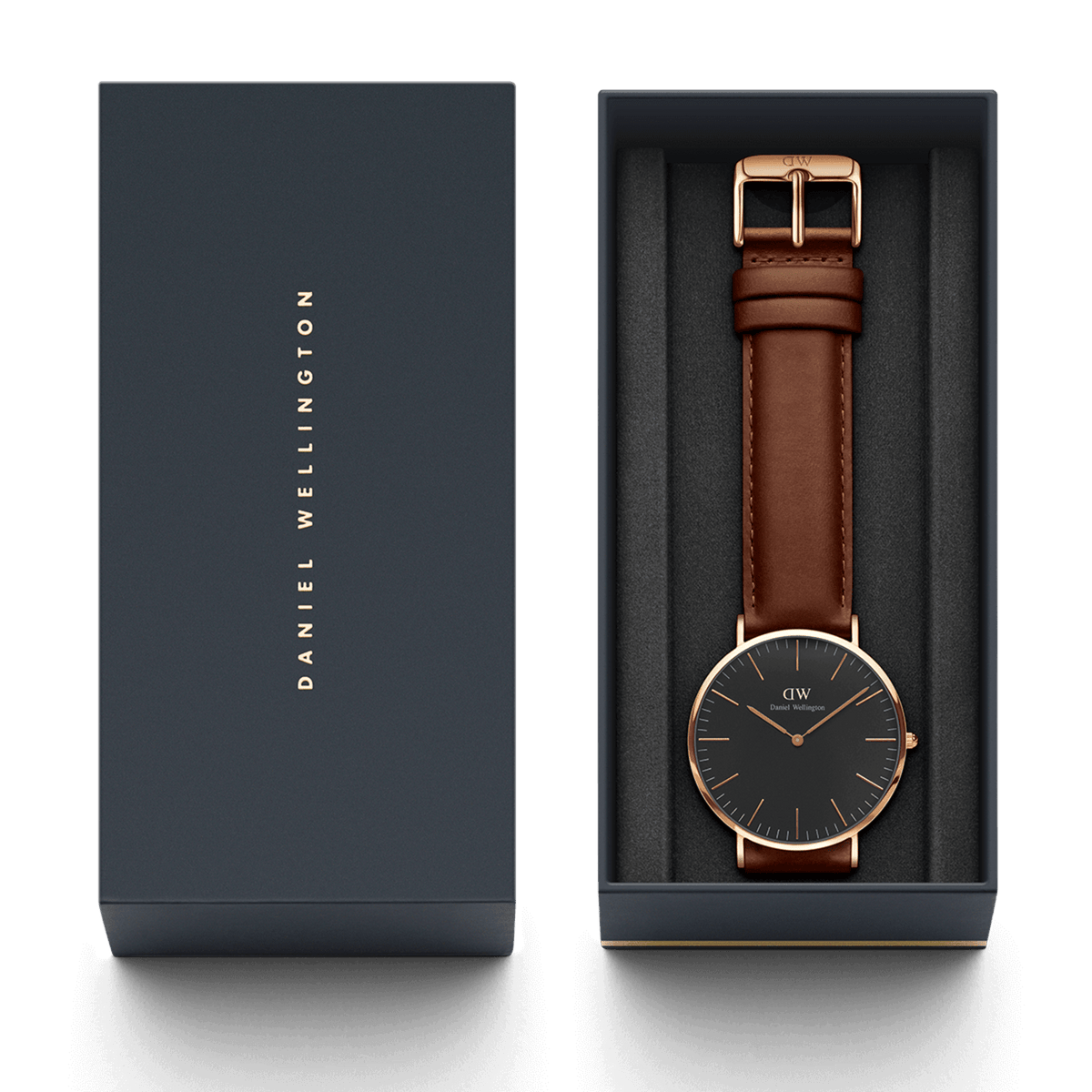 Classic St Mawes watch with a black dial, rose gold case, and brown leather strap presented in an elegant Daniel Wellington gift box.