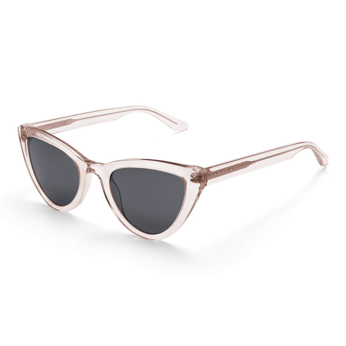 Lynx Bio-Acetate sunglasses featuring a transparent pastel pink cat eye frame and bold black lenses, shown from an angled view highlighting their modern, feminine design.
