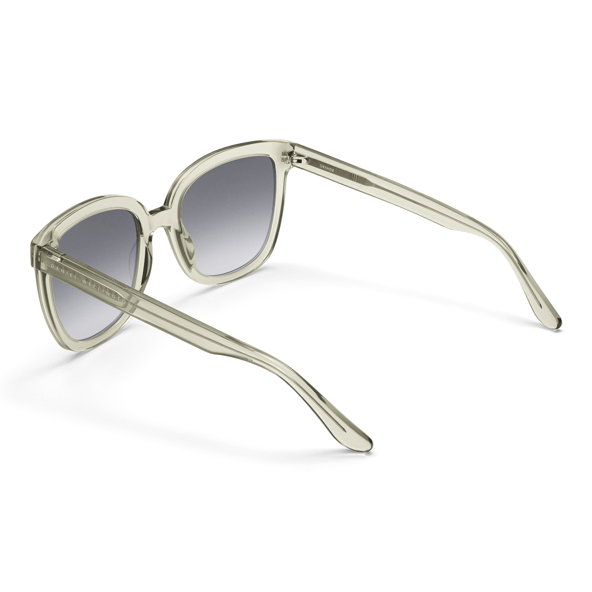 Grande Bio-Acetate Olive Olive sunglasses with oversized square translucent olive frames and black gradient lenses, viewed from the back and side to highlight the lightweight arms and stylish design.