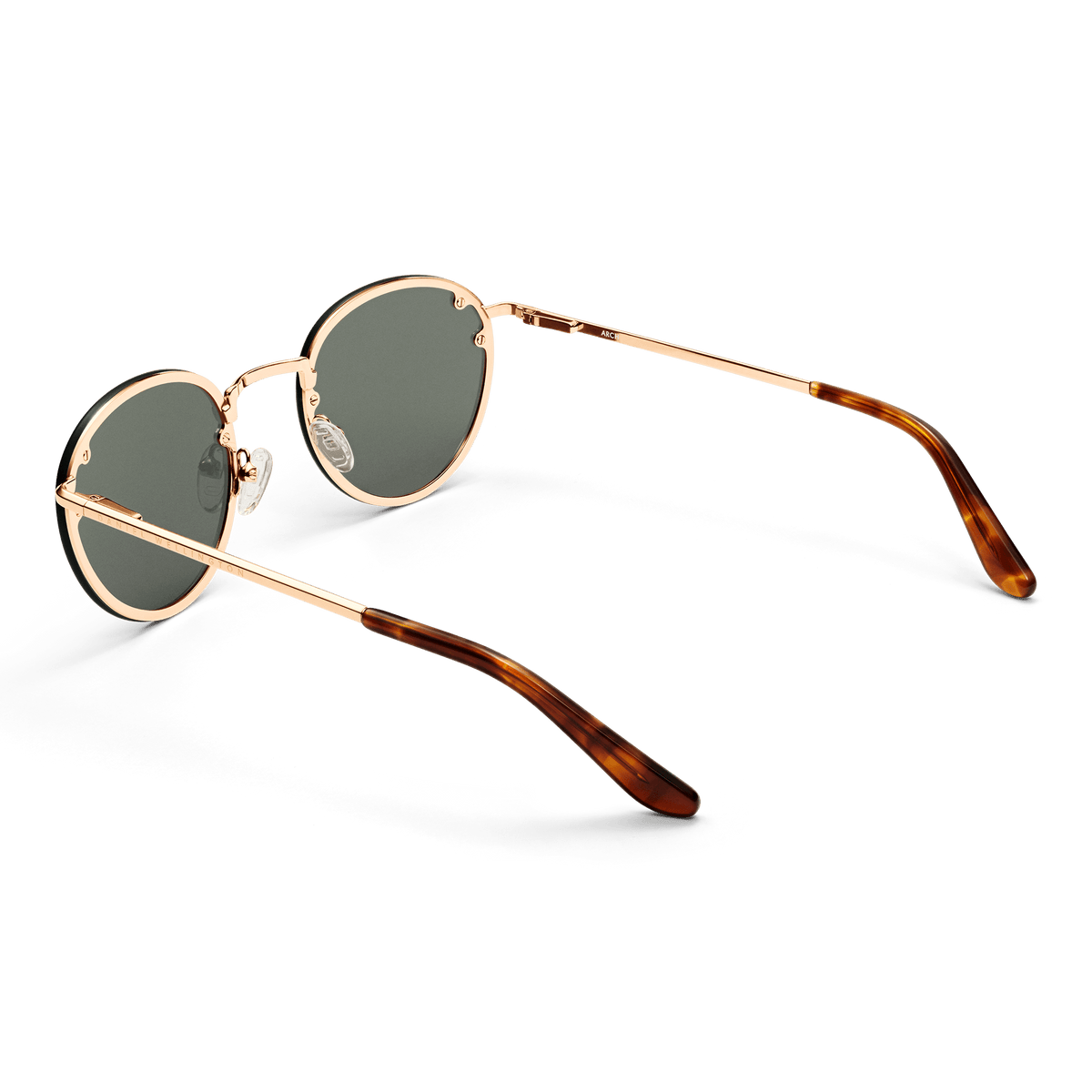 Arch Steel Green Rose Gold sunglasses by Daniel Wellington with round green lenses, slim rose gold stainless steel arms, and tortoiseshell-inspired temple tips.