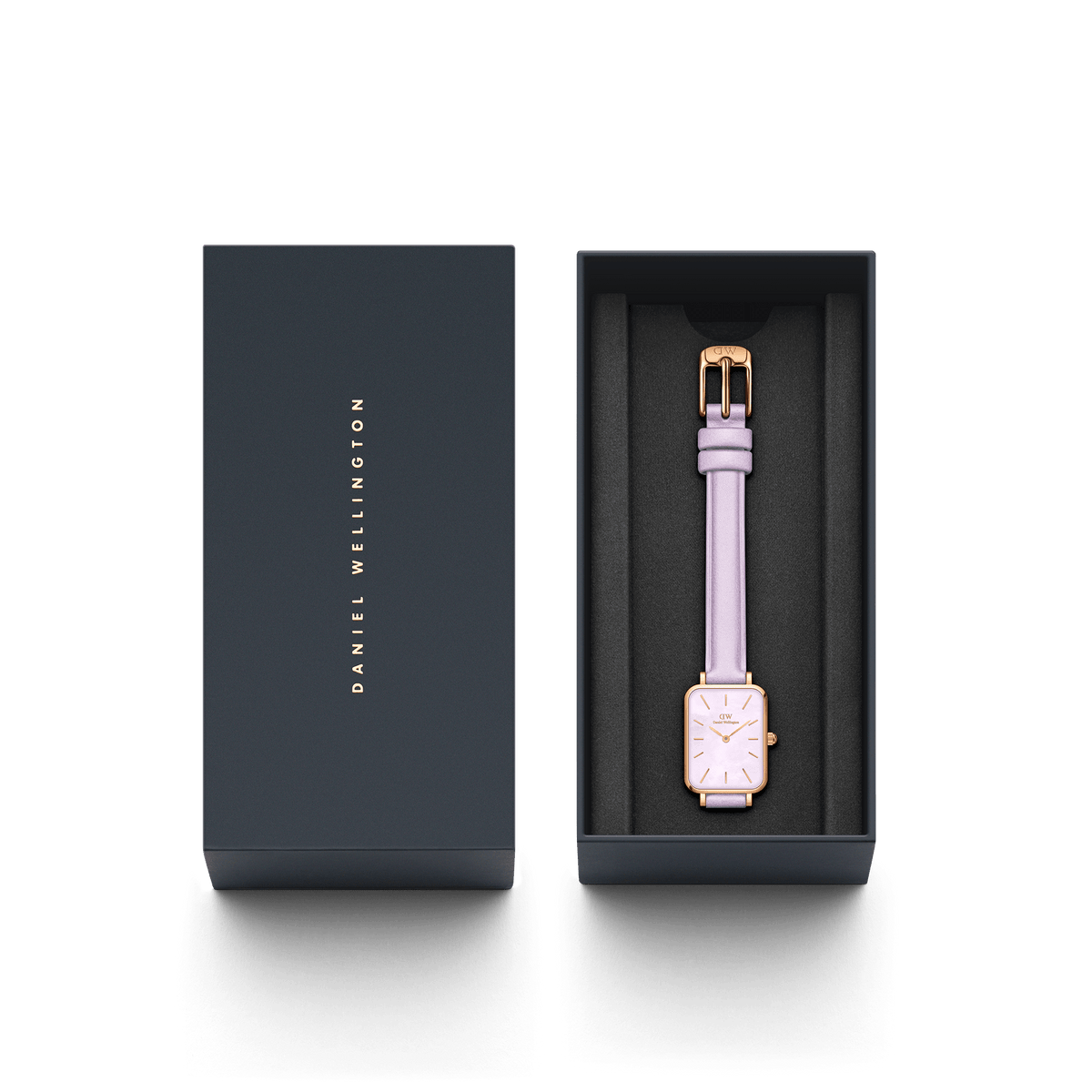 Quadro Lavender women’s watch with a pastel purple Italian leather strap and rose gold rectangular case, elegantly presented in a sleek Daniel Wellington gift box.