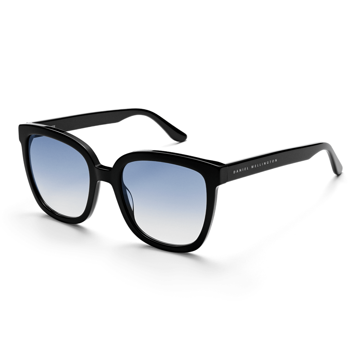 Grande Bio-Acetate Black Blue sunglasses featuring an oversized square black frame with blue gradient lenses and Daniel Wellington branding on the arm.