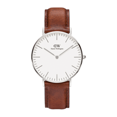 Minimalist Daniel Wellington Classic St Mawes watch with an eggshell white dial, slim silver case, and a smooth brown leather strap.