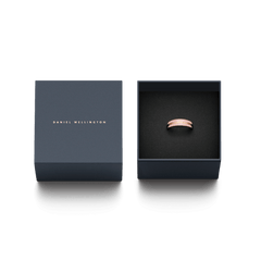 Emalie Ring Cherry Blossom Rose Gold Cherry displayed in an elegant Daniel Wellington gift box, highlighting the rose gold band with cherry blossom pink enamel and engraved logo, perfect for gifting or special occasions.