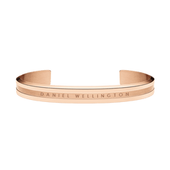 Sleek rose gold Daniel Wellington Elan Bracelet with an open cuff design, engraved logo, and polished minimalist finish.