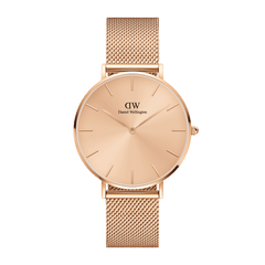 Rose gold Petite Unitone women’s watch featuring a 28mm round dial, minimalist face and an elegant mesh strap.