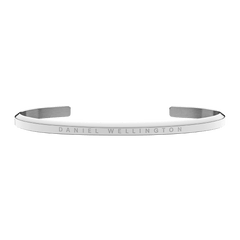 Slim silver open cuff bracelet with a polished finish and engraved Daniel Wellington logo on the front.