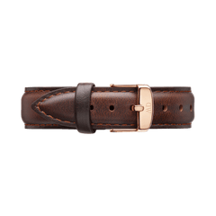 Bristol Strap Rose Gold in rich dark brown leather with contrast stitching and a polished rose gold buckle engraved with the Daniel Wellington logo, designed for a refined and timeless watch upgrade.