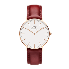 Classic Suffolk watch with a slim rose gold case, minimalist eggshell white dial, and a burgundy genuine leather strap.