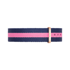 Navy blue and pink striped NATO watch strap made from durable polyester, featuring an 18mm width and a polished rose gold buckle with Daniel Wellington branding.