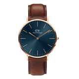 Classic St Mawes Arctic Rose Gold watch featuring a deep blue sunray dial, minimalist rose gold case, and a rich brown genuine leather strap. The elegant design combines modern style with timeless appeal, ideal for both casual and formal occasions.