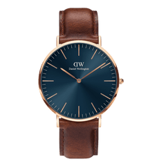 Classic St Mawes Arctic Rose Gold watch featuring a deep blue sunray dial, minimalist rose gold case, and a rich brown genuine leather strap. The elegant design combines modern style with timeless appeal, ideal for both casual and formal occasions.