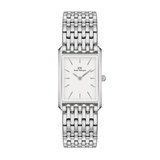 Rectangular silver women’s watch with minimalist white dial and polished 9-link stainless steel strap by Daniel Wellington.