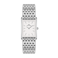 Rectangular silver women’s watch with minimalist white dial and polished 9-link stainless steel strap by Daniel Wellington.