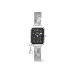 Contemporary women’s silver watch with a rectangular crystal-set bezel, black mother of pearl dial, and a silver mesh strap adorned with a sparkling zodiac charm.