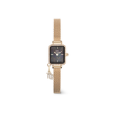Gold women’s watch with a rectangular crystal-framed case, black mother of pearl dial, gold mesh strap, and a sparkling Capricorn zodiac charm.